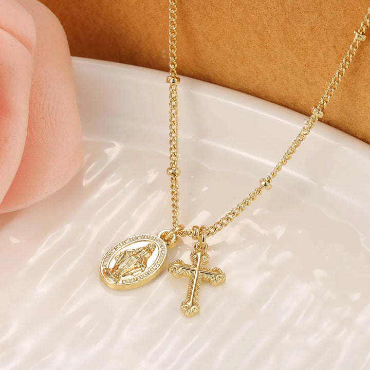 Miraculous Medal and Cross Pendant Close-up